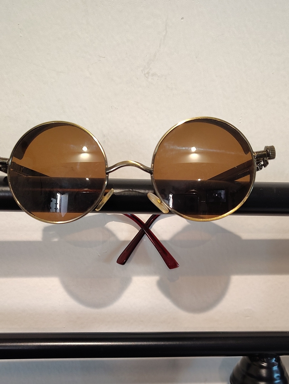 vintage-style round sunglassew/ a gold metal frame , brown lenses, Steampunk